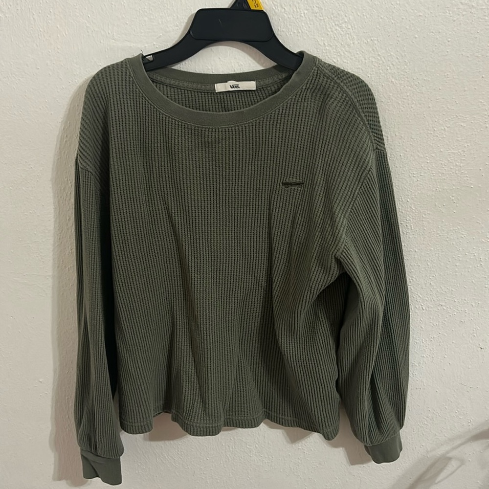 green knitted material crew neck